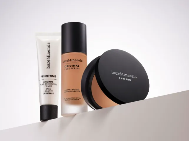 bareMinerals product shot: Prime Time primer, Original Pure Serum foundation and BarePro powder on a ledge