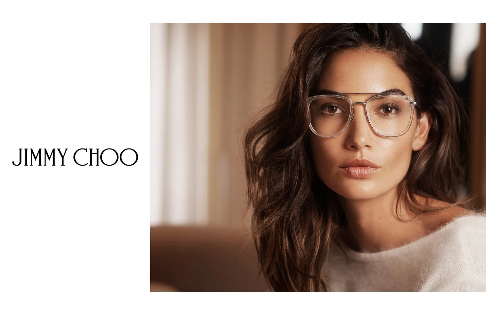 Jimmy Choo FW18 print ad layout: Lily Aldridge in oversized aviator glasses beside the Jimmy Choo wordmark