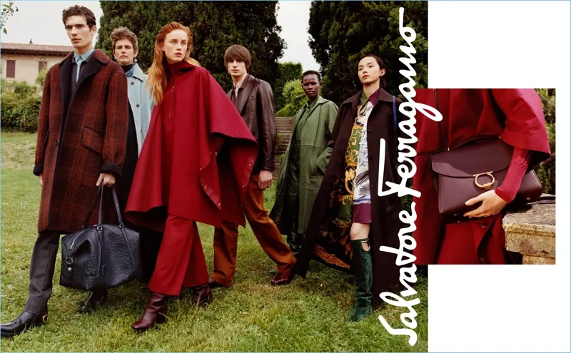 Salvatore Ferragamo FW18 campaign still: a group in red capes and plaid coats on a villa lawn, by Harley Weir
