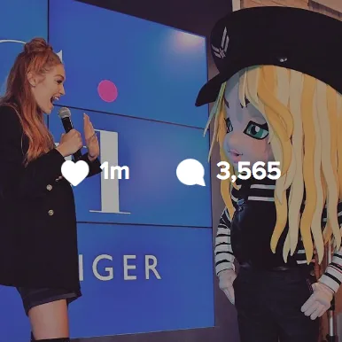 Instagram post of Gigi Hadid on stage with a microphone beside a cartoon Gigi mascot, 1 million likes