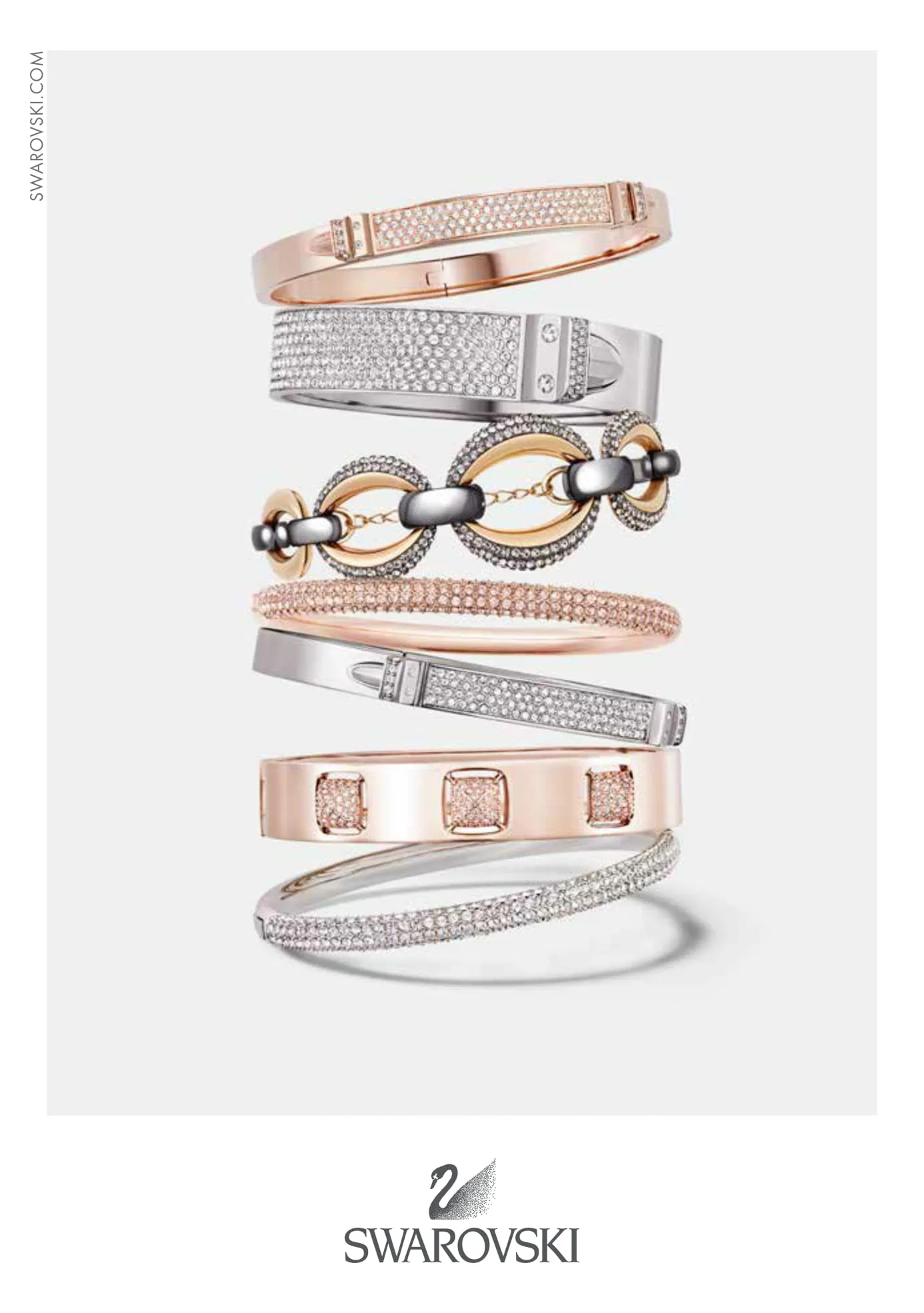 Multifacets back cover: stacked rose-gold and silver crystal bangles above the Swarovski logo