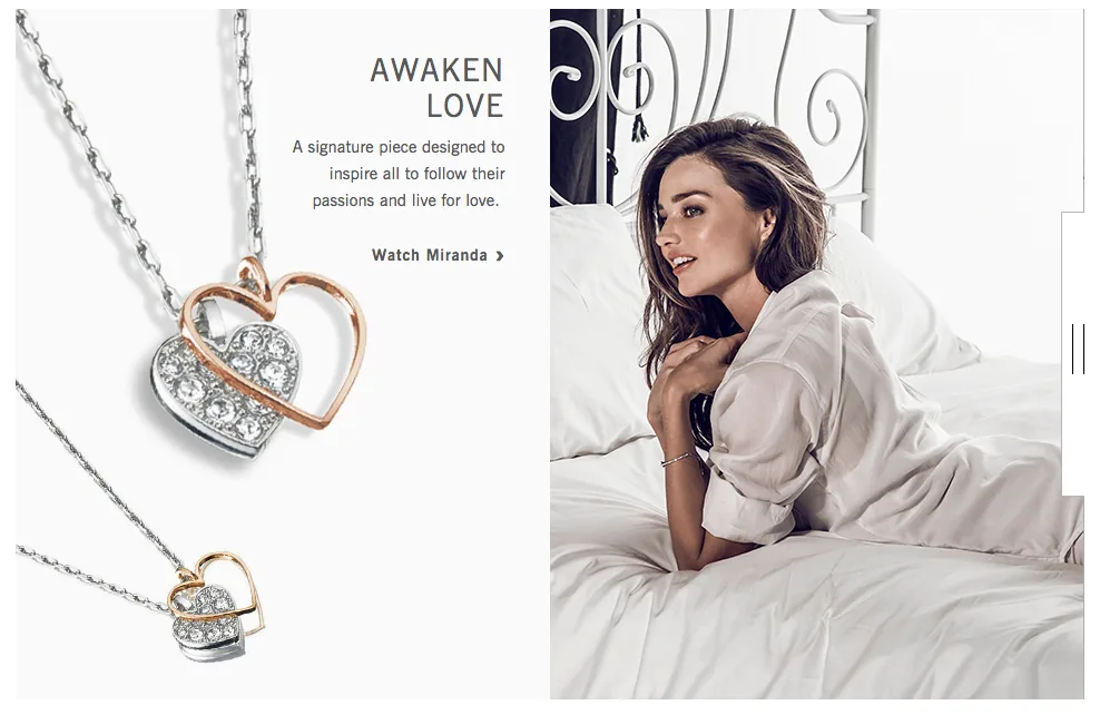 Swarovski web page Awaken Love: heart pendant necklaces beside Miranda Kerr in white