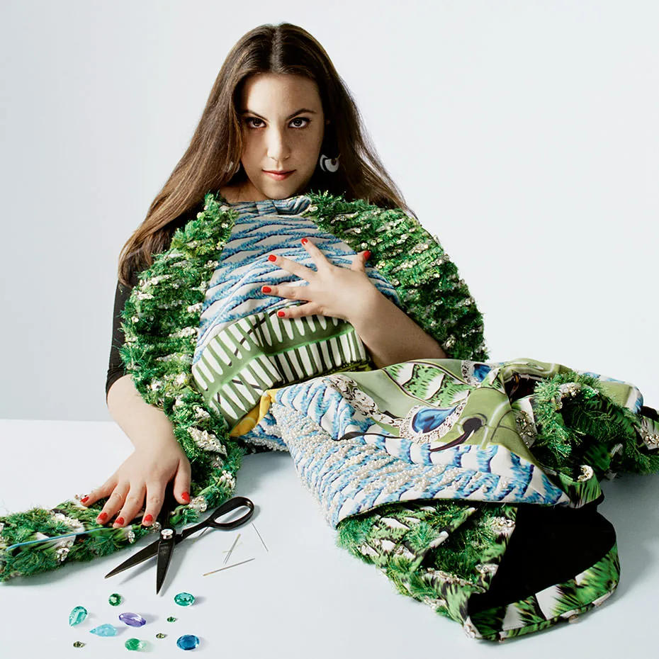 Mary Katrantzou reclining in green embroidered fabric with scissors, Swarovski Brilliant Inspiration portrait